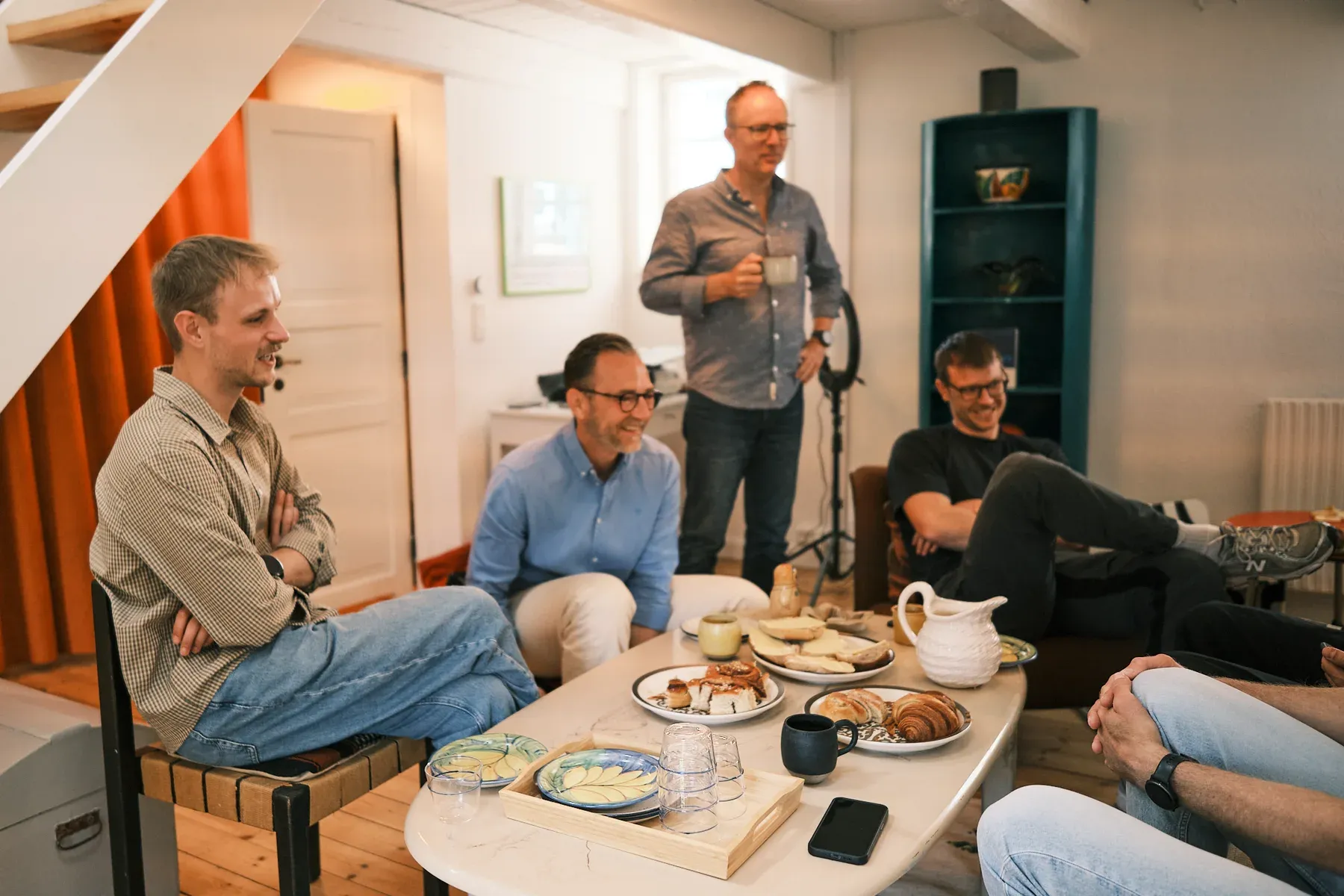Fruity colleagues gather around the table in the studio.